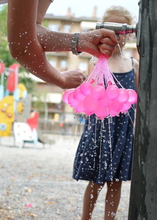 Splash pads in summer are a great way to keep your kids cool in summer - tips from Romp n' Roll North Raleigh!