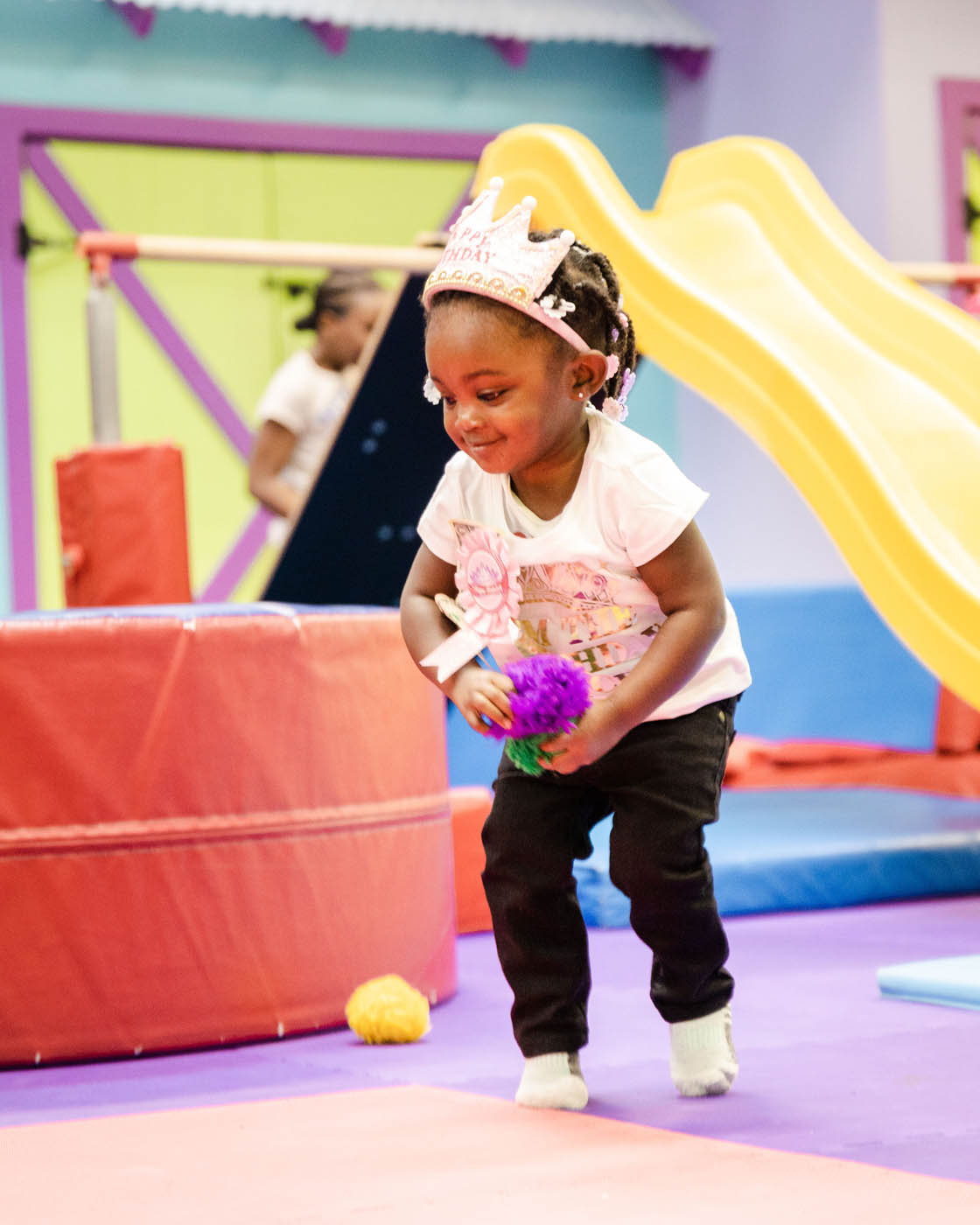 A little girl enjoying her b day party at Romp n' Roll kids birthday party places.