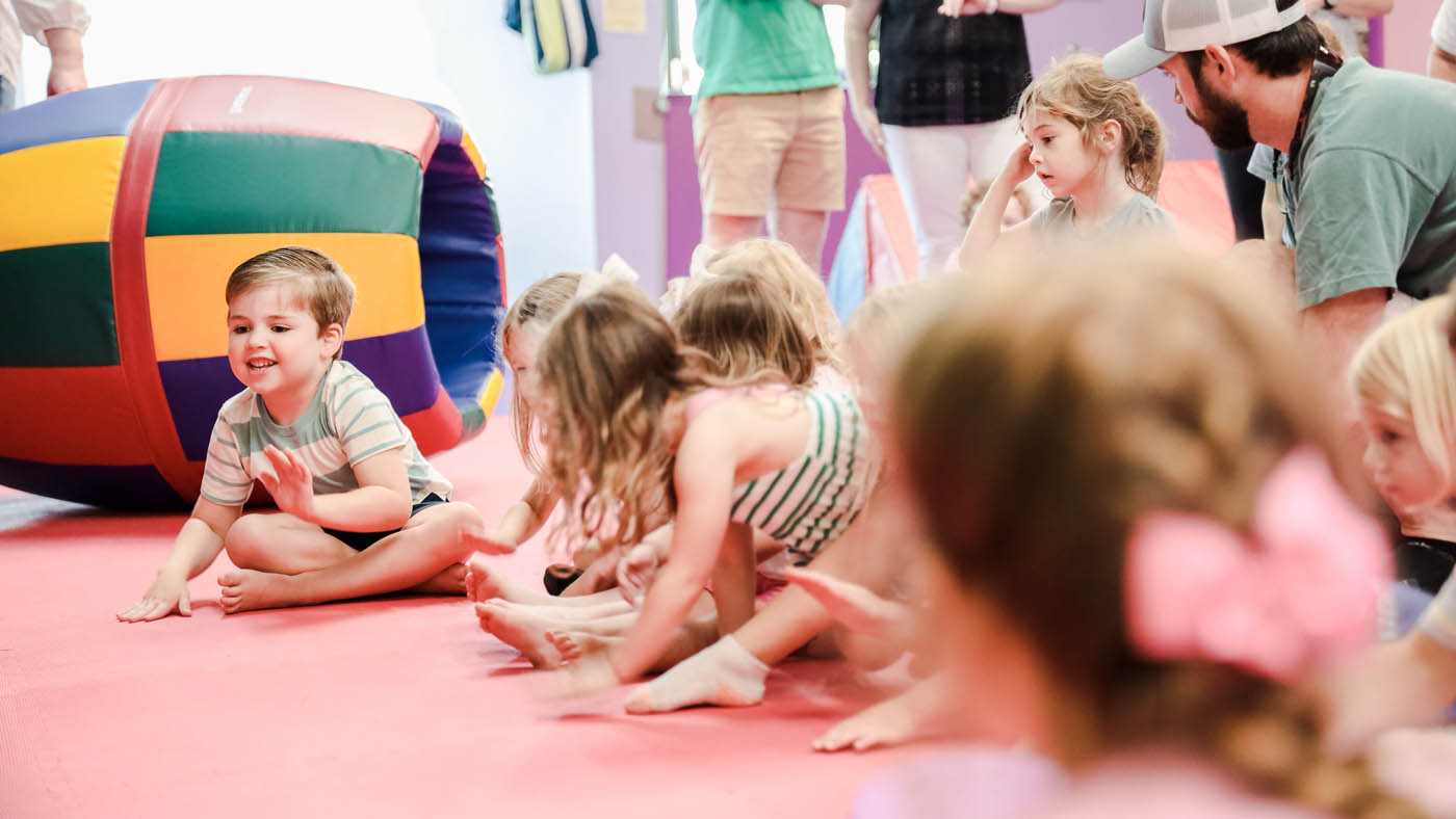 A group of kids exploring their senses together at autism safe sensory gym classes in Charlotte, NC.