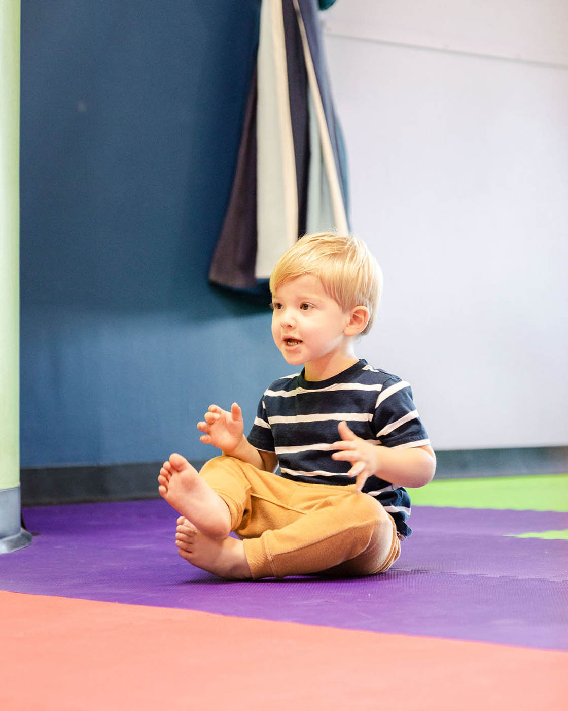 A boy at Romp n' Roll enjoying the sensory gym in Midlothian, VA.