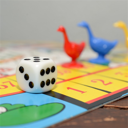 Playing board games is a great way to help young kids retain basic math skills.